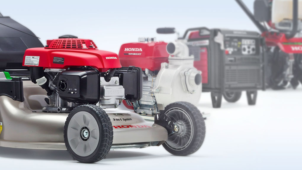 Tondeuse Honda au premier plan, pompe et génératrice en arrière-plan